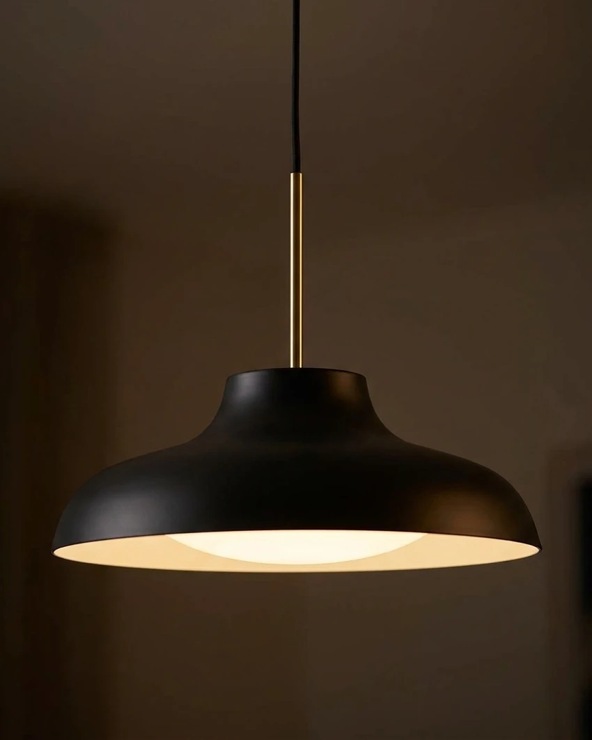 AI-generated black and brass pendant photography: the diffuser glow