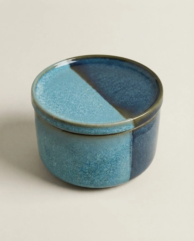 AI-generated blue glaze storage jar photography: elevated view