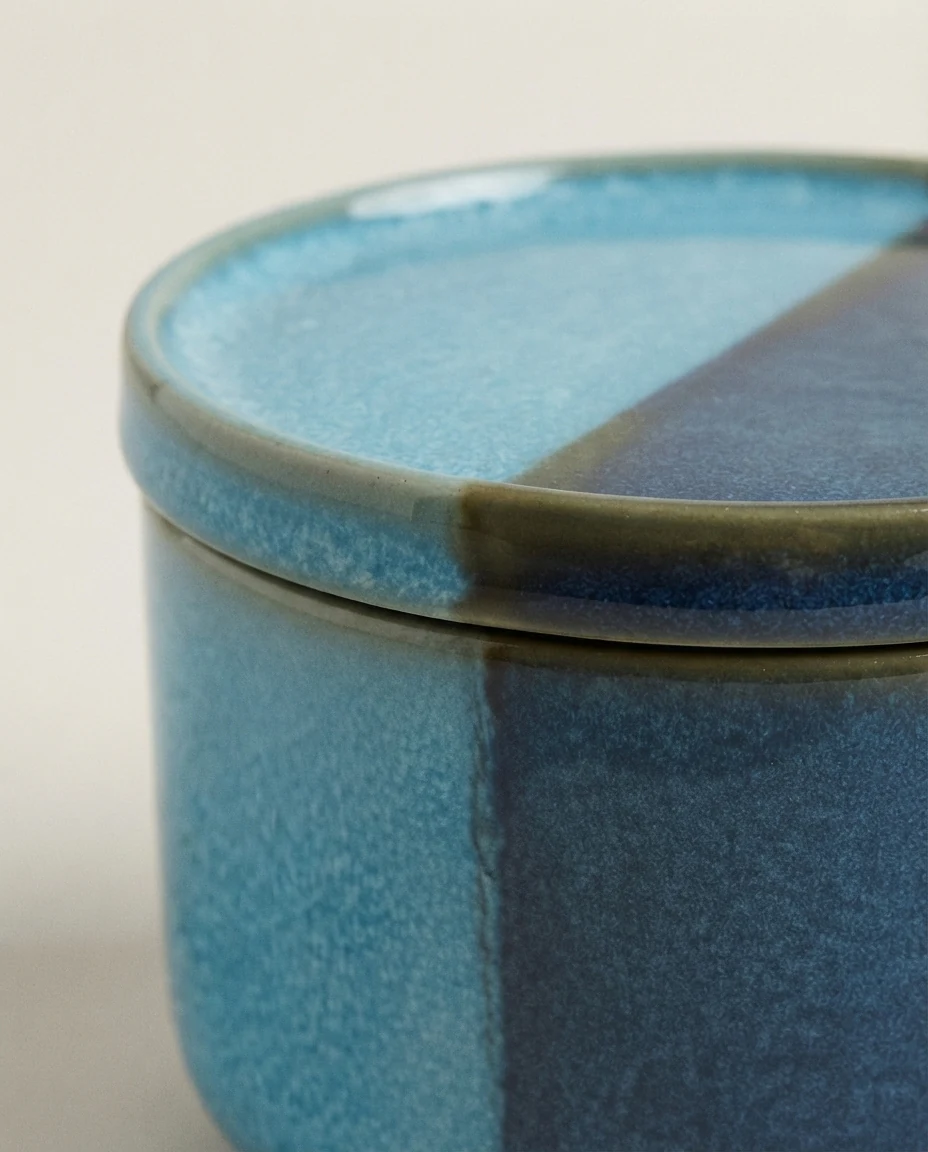 AI-generated blue glaze storage jar photography: glaze detail