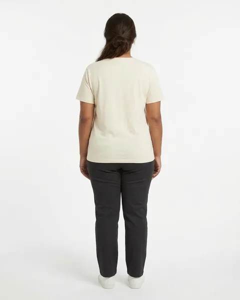 Fictional AI model Leila — back view in a neutral studio