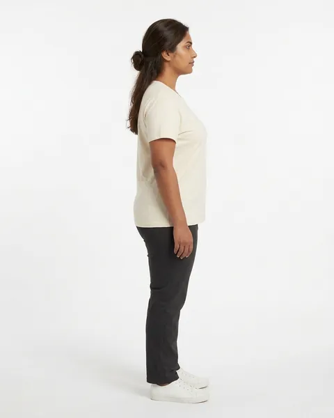 Fictional AI model Leila — side view in a neutral studio