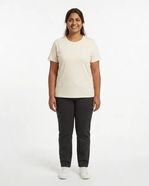 Fictional AI model Leila — smiling view in a neutral studio