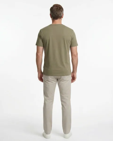 Fictional AI model Theo — back view in a neutral studio