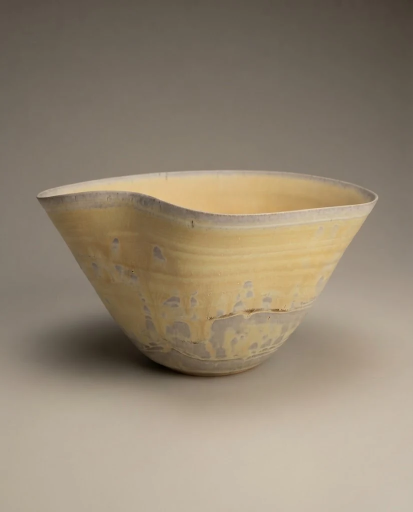 AI-generated ochre wave bowl photography: studio study