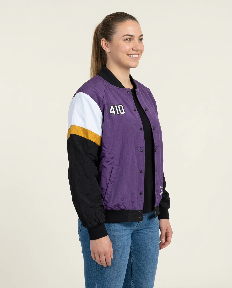 AI-generated purple varsity jacket photography: three-quarter view