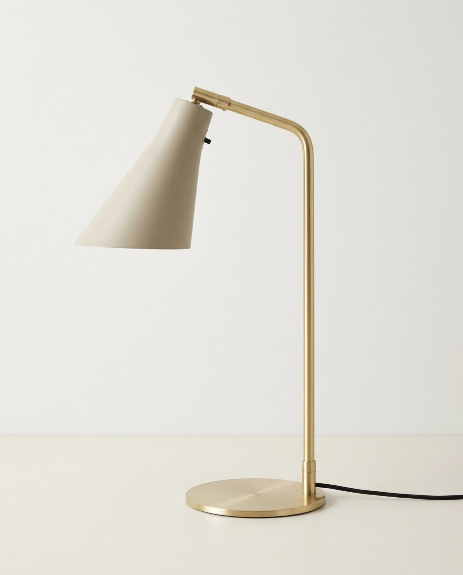 AI-generated sand and brass table lamp photography: daylight, plain wall