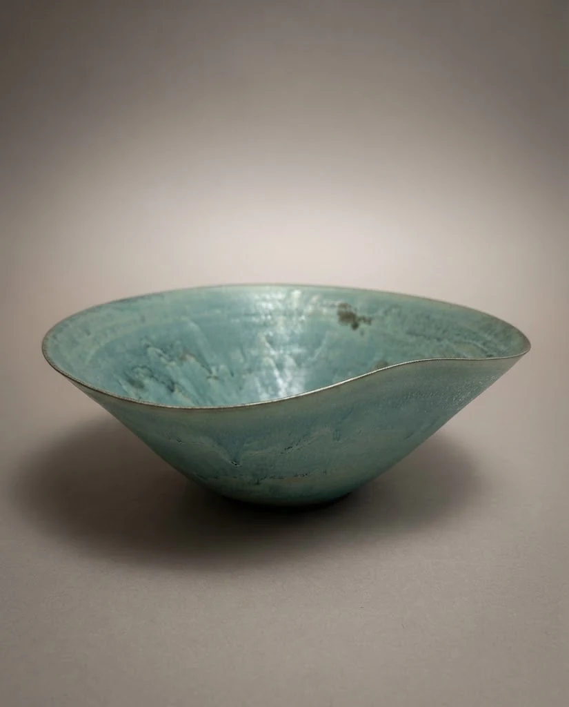 AI-generated sea-green wave bowl photography: studio study