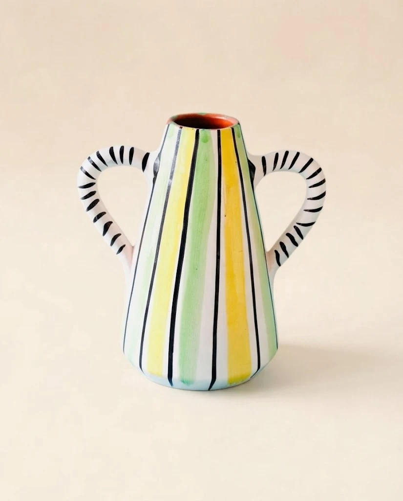 AI-generated striped ceramic vase photography: studio front