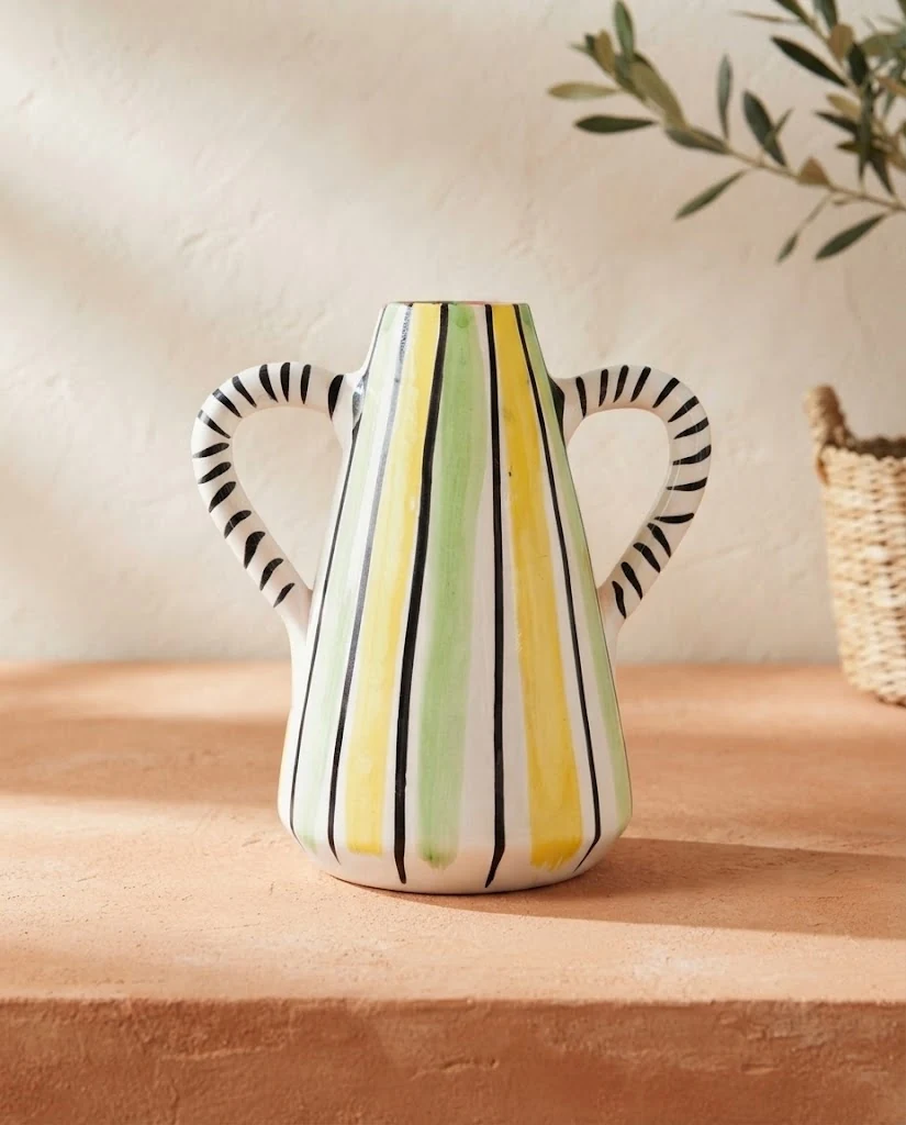 AI-generated striped ceramic vase photography: sunlit portrait