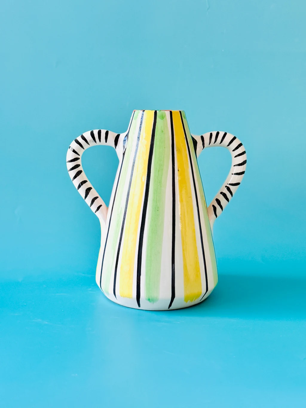 Original reference photograph of Striped ceramic vase